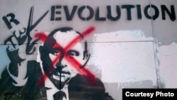 Un graffiti la Moscova: Putin Revolution" 