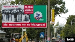 The placard reads 'Remember That We Are Not Moldova' on a Tiraspol street in Transdniester 