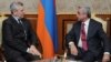 Armenia - President Serzh Sarkisian (R) meets with Italy's Defense Minister Giampaolo Di Paola in Yerevan, 16Oct2012.