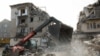 Rescue workers dig through the rubble in Selydove on November 15.