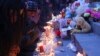 Armenia -- People light candles during a memorial ceremony for six-month-old boy Seryozha Avetisian on Liberty Square in Yerevan, January 20, 2015