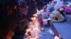 Armenia -- People light candles during a memorial ceremony for six-month-old boy Seryozha Avetisian on Liberty Square in Yerevan, January 20, 2015