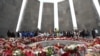 Armenia - People lay flowers at Yerevan's Tsitsernakabert memorial to victims of the 1915 Armenian genocide in Ottoman Turkey.