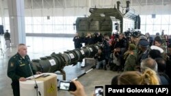 Lieutenant General Mikhail Matveyevsky speaks during a briefing by the Russian Defense Ministry, as the 9M729 land-based cruise missile is displayed near its launcher in Kubinka, outside Moscow, on January 23.