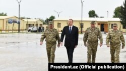 Azerbaijan - President Ilham Aliyev visits a military base in the Terter district.