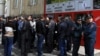 Armenia - Police officers and opposition activists stand outside the headquarters of the Founding Parliament movement, Yerevan, 7Apr2015.