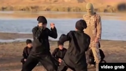 A screengrab from a video purportedly showing Uyghurs training somewhere in the Middle East and making threats against China. 