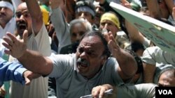 Iran - Iranian labors shout during a protest against their salary and the labor laws . UNDATED