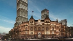 Здание Генерального штаба в центре Белграда, сфотографированное вскоре после завершения его строительства в 1965 году. Здание было специально построено для размещения в нем штаба югославских вооруженных сил и спроектировано так, чтобы имитировать каньоны, окружающие реку Сутьеска в современной Боснии и Герцеговине, где произошла ключевая битва Второй мировой войны