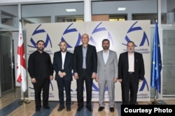 2016 წლის 29 აგვისტოს რელიგიის სააგენტოს მიერ გავრცელებულ ფოტოს თან ახლდა შემდეგი ტექსტი: "შეხვედრას ესწრებოდნენ სრულიად საქართველოს შეიხი რამინ იგიდოვი და მუსლიმი თეოლოგი, აიათოლა ჰამენეის კანცელარიის წარმომადგენელი მუჰამედბაღირ საივერი." ფოტოს ცენტრშია სააგენტოს ხელმძღვანელი.