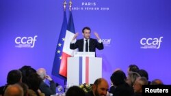 France - French President Emmanuel Macron speaks during the Co-ordination Council of Armenian Organisations of France (CCAF) annual dinner in Paris, February 5, 2019.