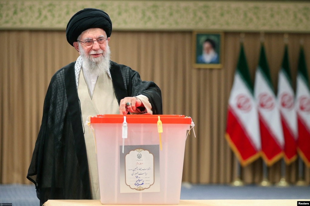 Iran's Supreme Leader Ayatollah Ali Khamenei votes during the presidential election in Tehran on July 5.