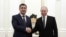 Kyrgyz President Sadyr Japarov (left) meets with Russian President Vladimir Putin in February.