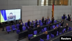 Ukrainian President Volodymyr Zelenskiy delivers a video address to the Bundestag in Berlin on March 17.