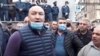 Armenia -- Kajaran Mayor Manvel Paramazian (L) leads a demonstration outside a police station in Kapan, May 24, 2020