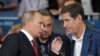 Владимир Путин, министр спорта Виталий Мутко и Александр Жуков, президент Олимпийского комитета России, на Олимпиаде в Лондоне. 2 августа 2012. Фото Алексея Дружинина /AFP 