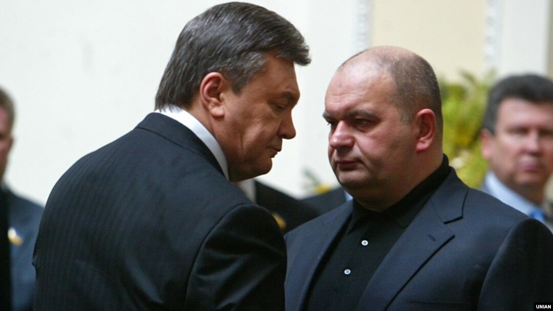 Former Ukrainian government minister Mykola Zlochevskiy (right) was closely associated with ousted President Viktor Yanukovych (left). 