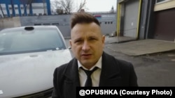 Аляксей Хлястоў. Скрын зь фільму праекту OPUSHKA, 3 траўня 2026 году