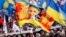Украинаның Еуропа Одағымен интеграциялануын жақтаушылар шеруге Юлия Тмошенконың суретін көтеріп шықты. Киев, 24 қараша 2013 жыл.