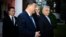 Chinese President Xi Jinping (center) talks with Hungarian Prime Minister Viktor Orban (right) prior to their official talks in Budapest on May 9.