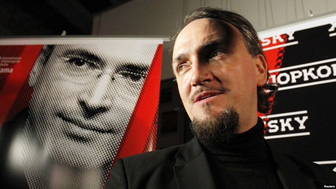 Director Cyril Tuschi talks to journalists after a screening in Moscow on November 24.