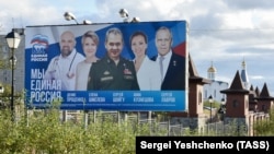 An election campaign banner showing candidates from United Russia is seen in Murmansk.