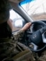 UKRAINE - NEAR POKROVSK - UKRAINIAN SOLDIER DRIVING A CAR - NOVEMBER 2025