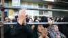 A crowd in Zabol watches a man being hanged this summer