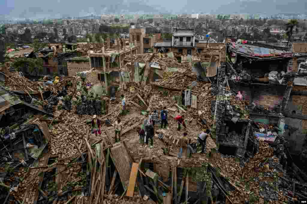 Third Prize in the General News Stories category was won by Australian Getty Images photographer Daniel Berehulak for his coverage of the Nepal earthquake aftermath. This image from the series shows residents searching the rubble of their homes for salvageable items. (April 29, 2015)&nbsp;