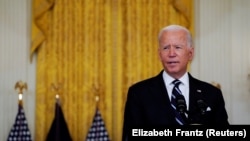 U.S. -- U.S. President Joe Biden delivers remarks on the coronavirus disease (COVID-19) response and vaccination program during a speech in the East Room at the White House in Washington, U.S., August 18, 2021.