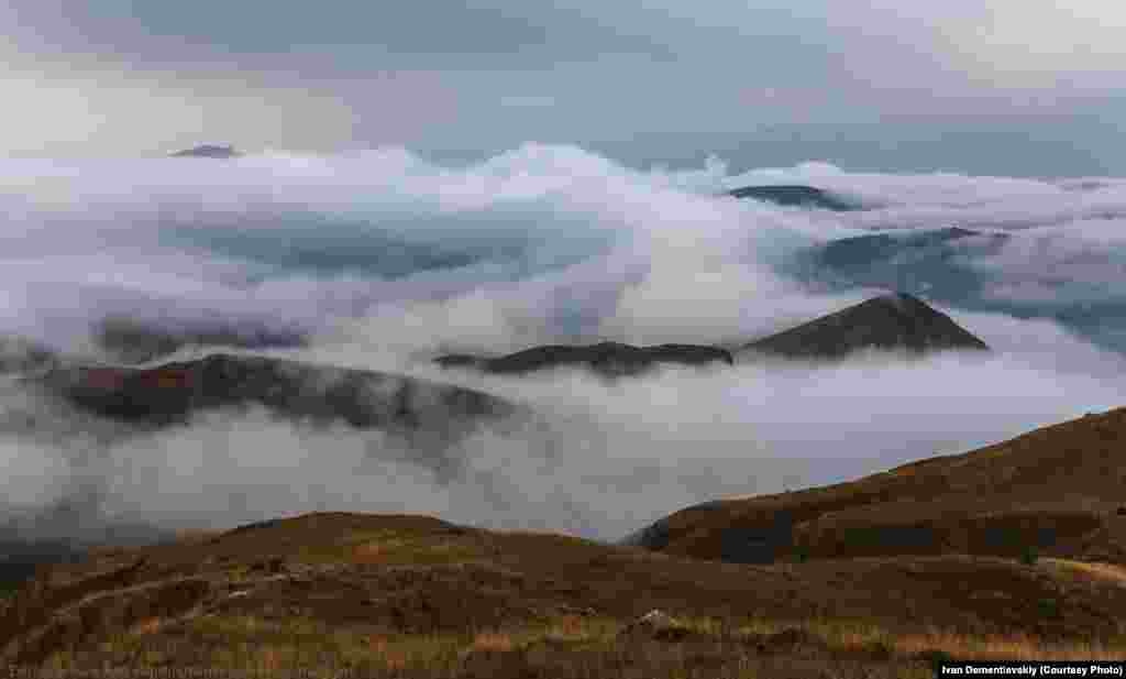 Evening in the highlands on the border between Armenia and Nagorno-Karabakh. As the sun sets a sharp cold sets in and fog rises from the sun-drenched fields.&nbsp;