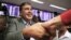 Mikheil Saakashvili greets his supporters upon his arrival at Boryspil airport outside Kyiv on May 29.