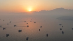 Adrone view shows vessels in the Strait of Hormuz, as seen from Musandam, Oman, on June 15.