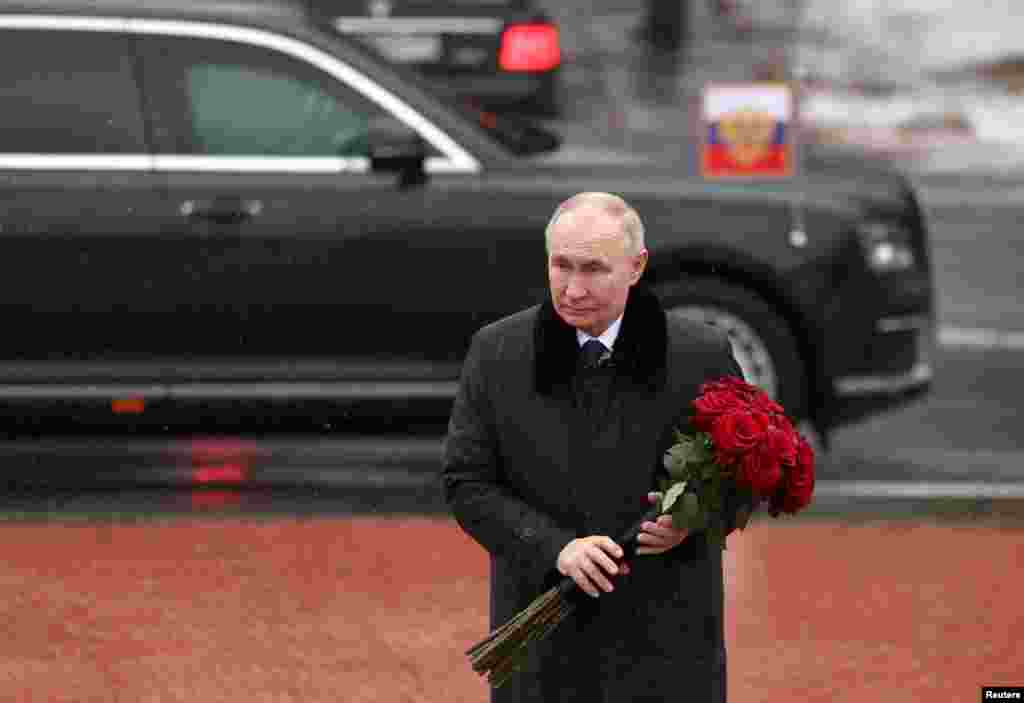 Russian President Vladimir Putin attends a flower-laying ceremony in the town of Kirovsk in the Leningrad Region on January 27, marking the 81st anniversary of the lifting of the Leningrad siege during World War II.&nbsp;