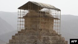 Iran -- Visitors look at the limestone tomb of ancient Persia's King Cyrus the Great, who founded the Achaemenid empire in the 6th century B.C. in Pasargadae near the Shiraz, some 950 km south of Tehran, July 9, 2008 