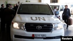 A UN vehicle carrying a chemical weapons investigation team in Damascus (file photo)