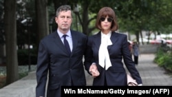 Sam Patten (left), a former associate of Paul Manafort, leaves the U.S. District Court in Washington, D.C. on August 31.