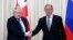 British Foreign Secretary Boris Johnson (left) and his Russian counterpart, Sergei Lavrov, held talks in Moscow on December 22.
