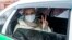 Lyubov Sobol is driven in a prison car to the headquarters of the Investigative Committee in Moscow on February 4.
