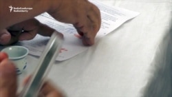 Kazakhs Sign Letter To President Nazarbaev In Blood