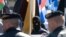 Russia -- Participants of Russian nationalist march on May Day, wearing face masks, 01May2009 