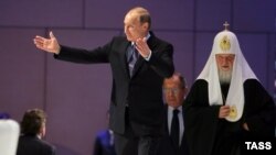 Російський президент Володимир Путін і патріарх РПЦ Кирило