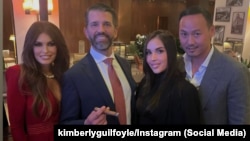 Donald Trump Jr.'s (2nd left) partner, Kimberly Guilfoyle (left), posted this image on Instagram after dinner in Belgrade on September 23.