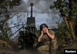 Militarii ucraineni trag cu un obuzier autopropulsat asupra pozițiilor rusești de pe linia frontului din regiunea Zaporijia, pe 25 mai 2026.