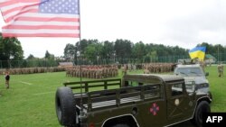 La deschiderea exercițiilor militare americano-ucrainene de la poligonul Iavoriv, de lângă Lvov, 20 iulie 2015