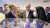 The head of the International Atomic Energy Agency, Rafael Grossi (left), visits the headquarters of Iran's Atomic Energy Organization in Tehran in April. 