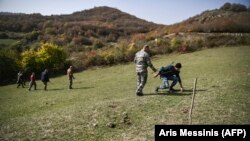 NAGORNO-KARABAKH -- Members of the Karabakh Ministry of Emergency Situations search for unexploded cluster bombs on the outskirts of Stepanakert, October 20, 2020