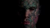 Video grab, source: REUTERS. Sylavin Helaine, a french teacher. "I lost job teaching kindergarten because of my tattoos"