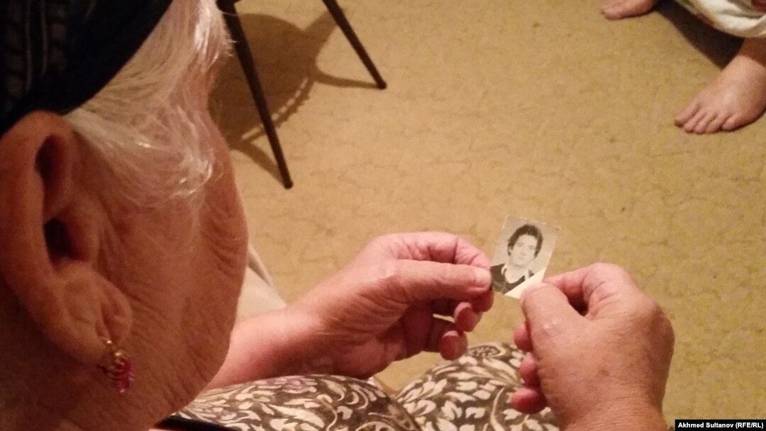 "Only the thought that we will be together after I die brings me solace," says Zura Batayeva, gazing at a picture of her son.