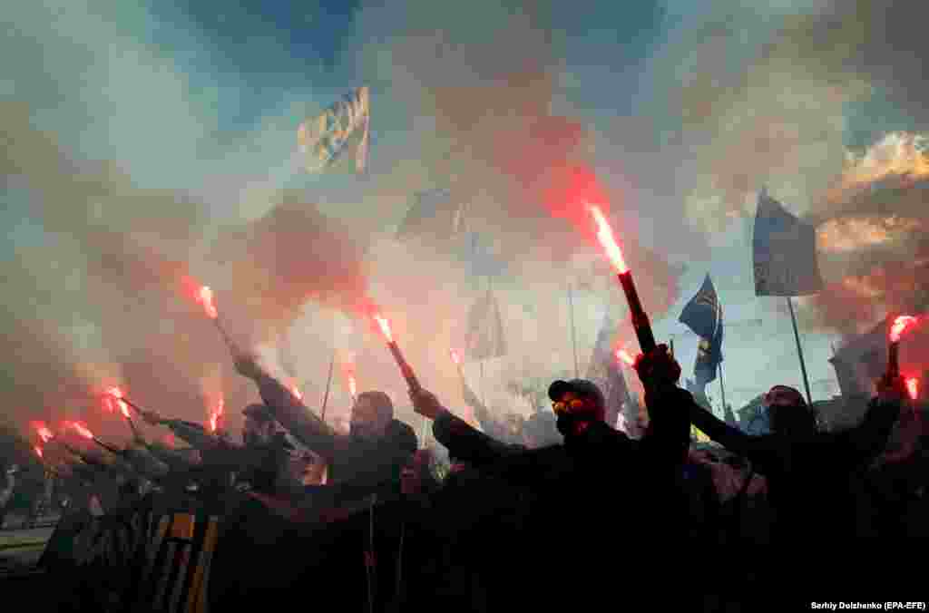 Activists from various Ukrainian nationalist parties attend a rally in downtown Kyiv on October 14. (epa-EFE/Sergey Dolzhenko)